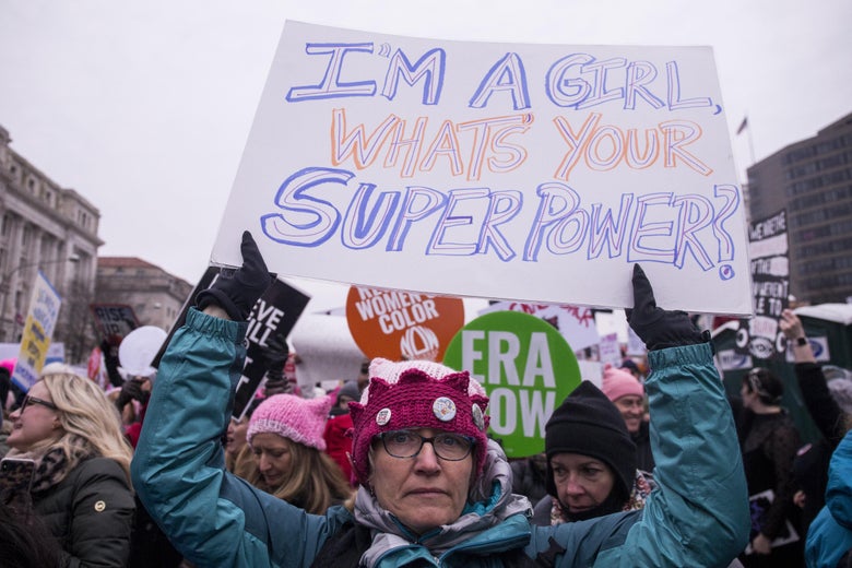 A demonstrator holds a sign during the 2019 Women's March on January 19, 2019 in Washington, D.C.